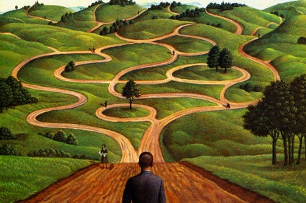 Man Standing At Beginning Of Winding Road